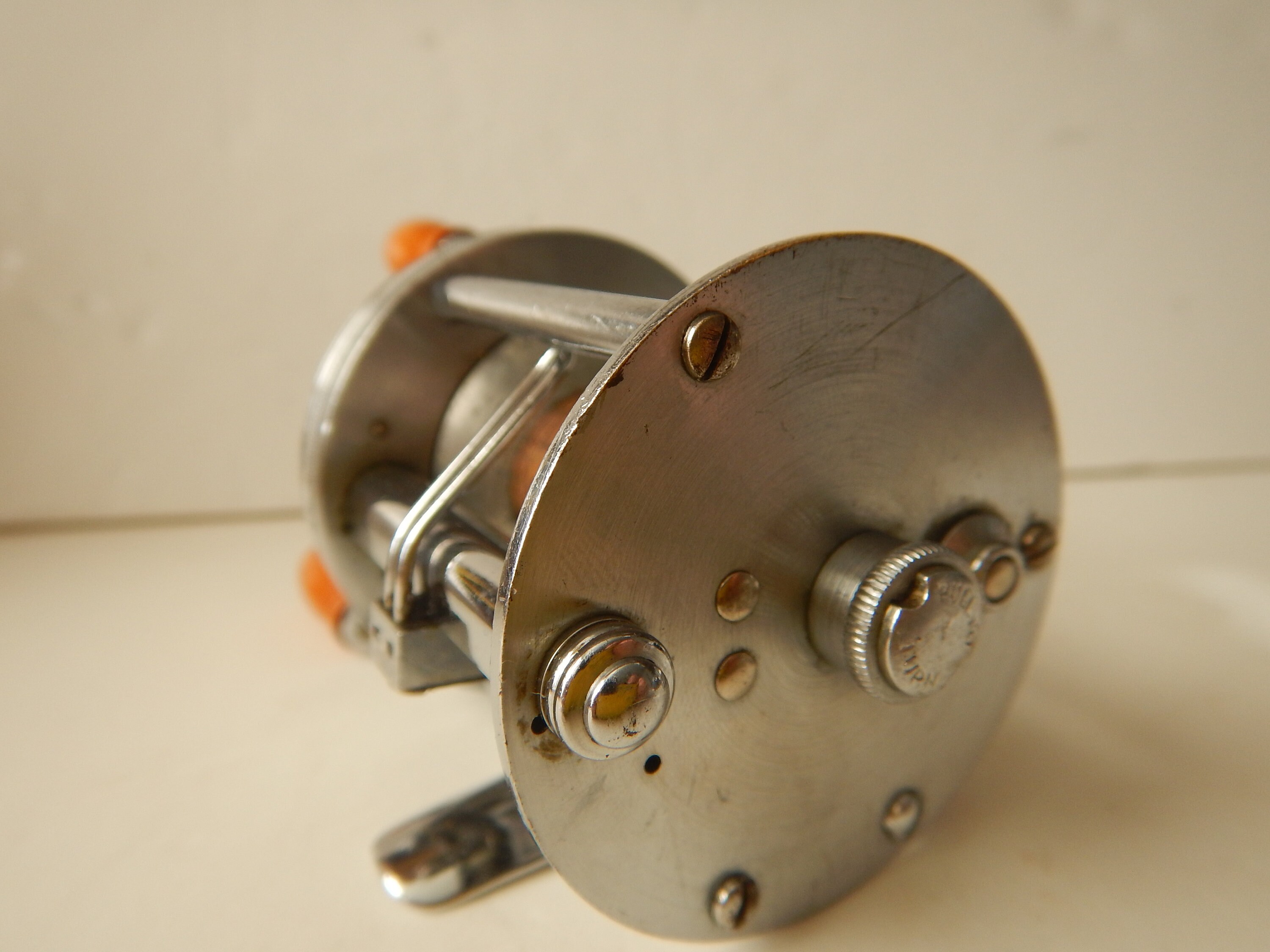 Vintage J. A. Coxe model 60 casting fishing reel. Circa
