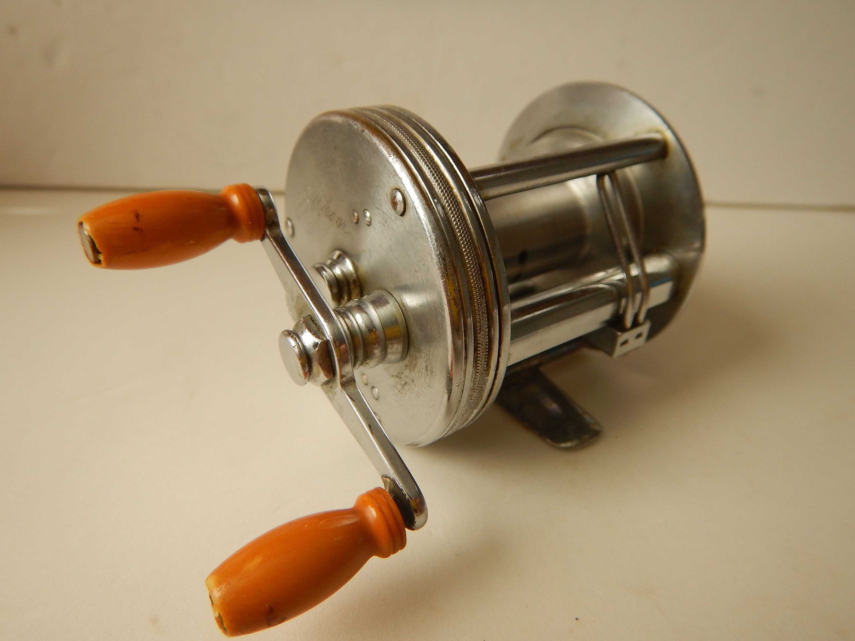 Vintage J. A Coxe model 60 casting fishing reel. Circa