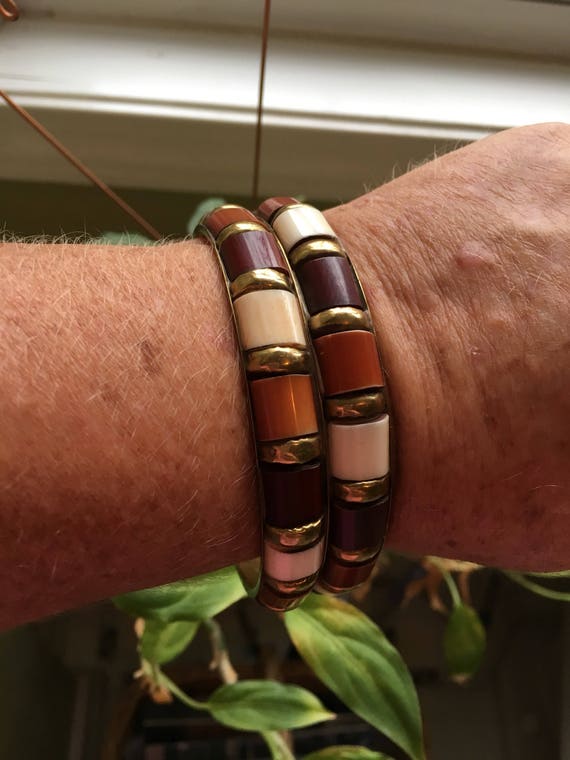 Pair of lucite bracelets, pair of bangle bracelets