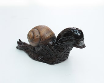 Alien snail tabletop figure