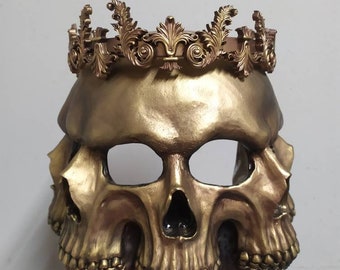 Five faces gold skull