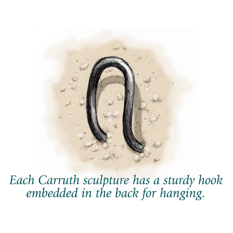 May include: A close-up of a sturdy metal hook, designed for hanging, embedded in the back of a sculpture. The hook is made of a dark metal and is shaped like a U.