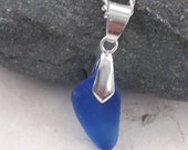 Naturally tumblesd sea glass, sea stone in rare dark blue, top drilled, pinch bail, pendant