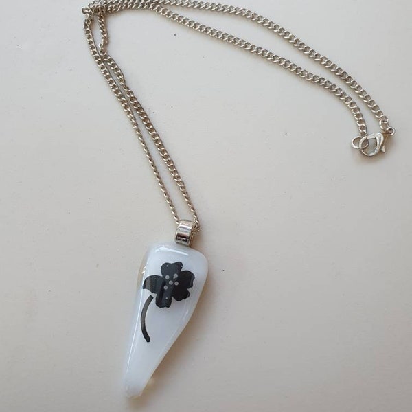 Fused glass pendant in monochrome with flower centre