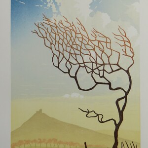 Windswept I lino print of windswept thorn tree rocks moorland and blue sky on Dartmoor