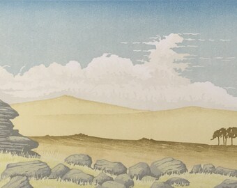 Windswept I lino print of windswept thorn tree rocks moorland and blue sky on Dartmoor