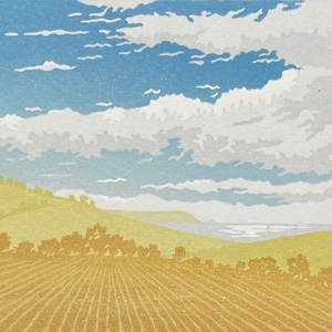 Coastal Fields lino print: fields, view across bay, clouds, Devon Coast