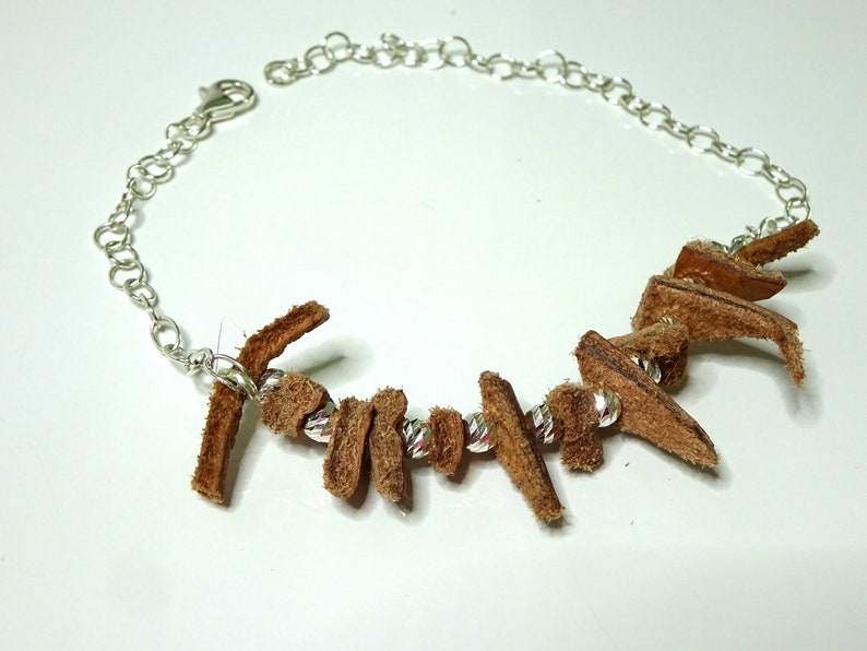 Set earrings bracelet necklace synthesis of leather and silver