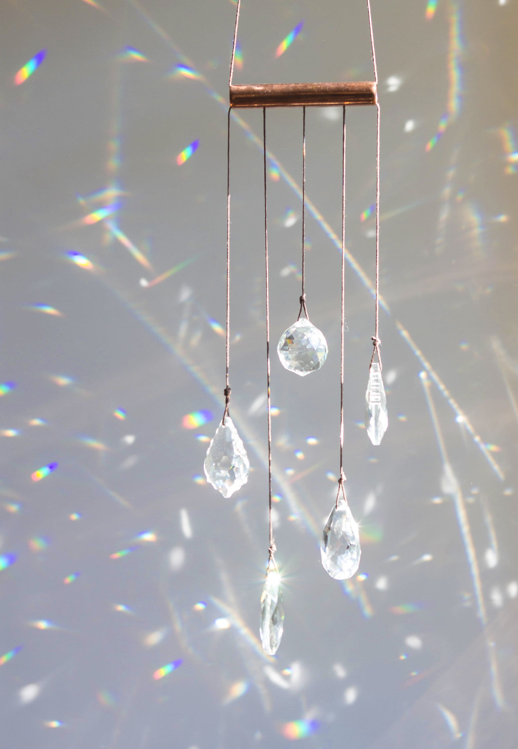 Hanging crystals in windows discount