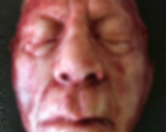 Skinned old man face