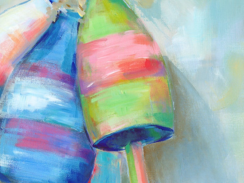 May include: Three colorful, striped buoys, painted in shades of blue, green, pink, and white. The buoys are stacked on top of each other, with the blue buoy on the bottom, the green buoy in the middle, and the pink buoy on top.