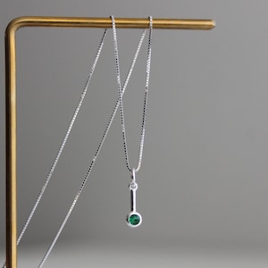 Small sterling silver pendant with emerald zircon necklace