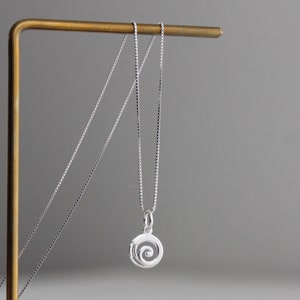 Sterling silver necklace with swirl / spiral pendant
