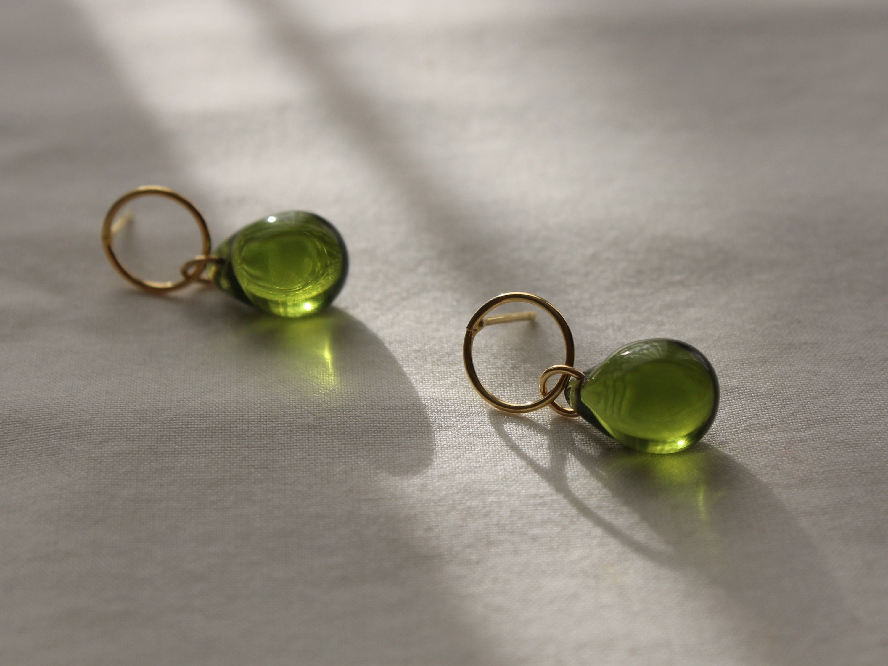 Gold plated over silver hoop earrings with peridot green / olive green glass teardrops Essential Minimal earrings Gift for her
