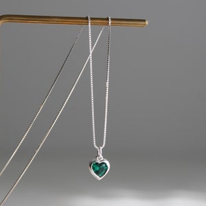 Sterling silver necklace with small emerald green zircon heart pendant
