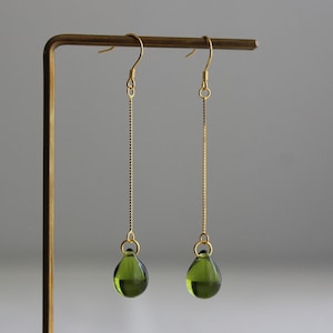 Gold pated over silver chain and peridot green / olive green teardrop earrings
