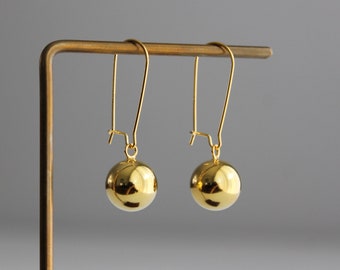 Gold plated over silver 12mm ball earrings with oversized kidney ear wires