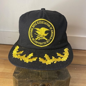 Boné de caminhoneiro vintage da National Rifle Association K-Products dos anos 80 | Boné de malha adulto da NRA