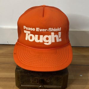 Boné de caminhoneiro vintage Pease Ever Shield Snapback | Boné de malha adulto