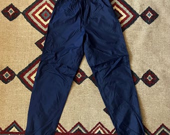 Pantalones cortavientos Nike de los años 90 / Pantalones de jogging vintage de nailon azul marino mediano