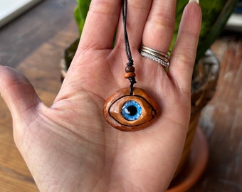 Carved Avocado Pit, Blue Eye Pendant, Eye Necklace, Avocado Stone Faces, Avocado Pit Necklace, Birthday Gifts, Christmas Gifts, Carved Eye