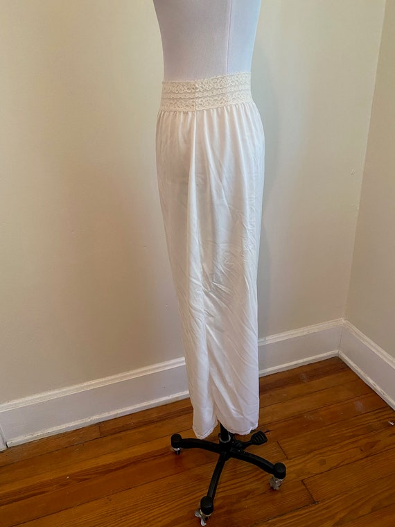 36" Long Large Half Slip with one side kick in white.… Gem