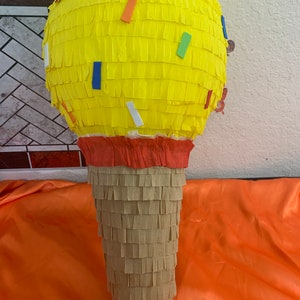 May include: A set of three ceramic mugs with a speckled, matte finish. The mugs are in shades of cream, light gray, and dark gray. Each mug has a simple, minimalist design, perfect for coffee or tea.