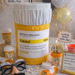 May include: A yellow and white cylindrical pi&ntilde;ata designed as a prescription pill bottle with the text Old Farts Pharmacy and Fukitol 100mg. It is surrounded by small orange pill bottles filled with candy, a pair of glasses with a nose and mustache.