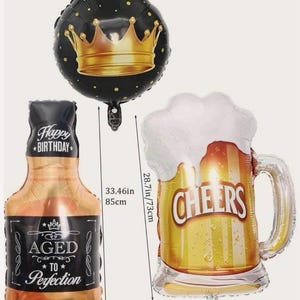 K&ouml;nnte beinhalten: Ein Set aus drei Folienballons, bestehend aus einem schwarzen runden Ballon mit goldener Krone, einem braunen flaschenf&ouml;rmigen Ballon mit der Aufschrift Happy Birthday Aged to Perfection und einem Bierkrug-Ballon mit der Aufschrift Cheers, Ma&szlig;e 46cm, 85cm, 51cm, 45cm.