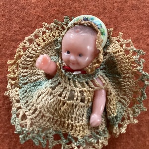 Small Plastic Doll