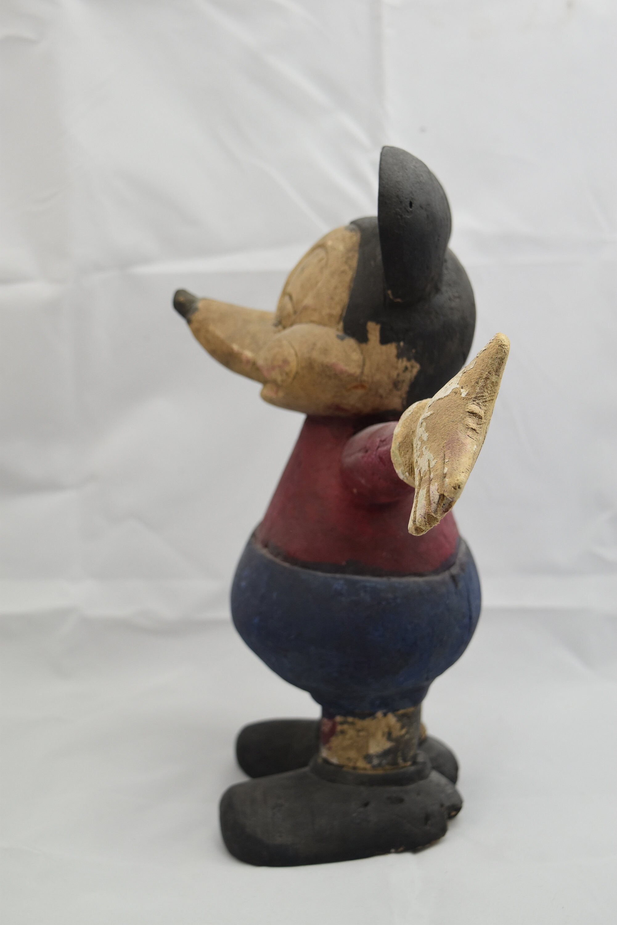 large wooden mickey mouse statue