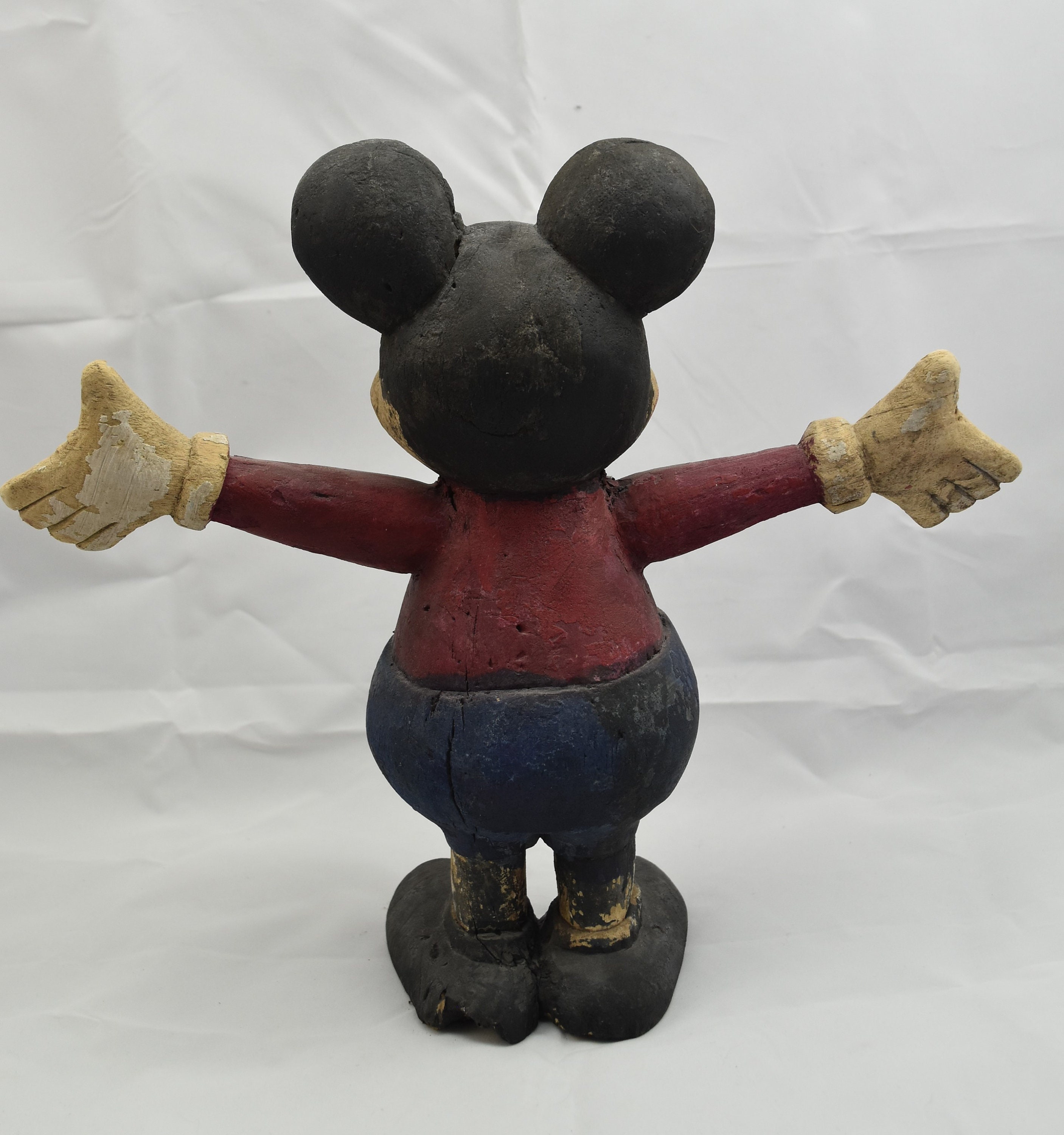 large wooden mickey mouse statue