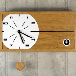 Cuckoo clock, rectangular strict form,oak veneer