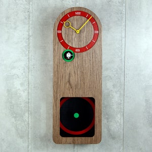 Modern cuckoo clock, multicolored, round big pendulum