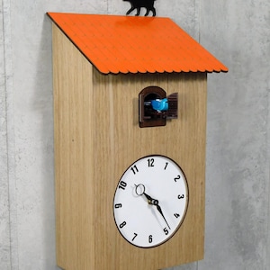Clock-House with a cuckoo and a cat on the roof,two-color pendulum