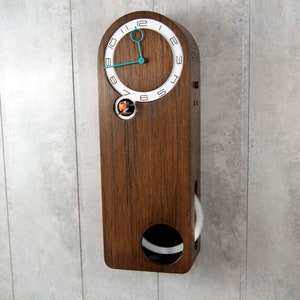 Modern cuckoo clock, round big pendulum