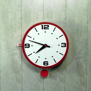 Round red cuckoo clocks