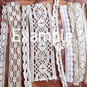 May include: Assortment of white and cream colored lace trim. The lace trim is made of delicate crocheted patterns.