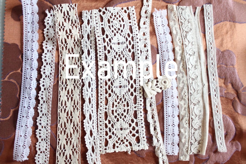 May include: Assortment of white and cream colored lace trim. The lace trim is made of delicate crocheted patterns.