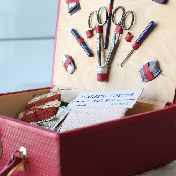 Sewing box filled with spool of thread, pair of scissors, thimble, lace, ribbon, 3743