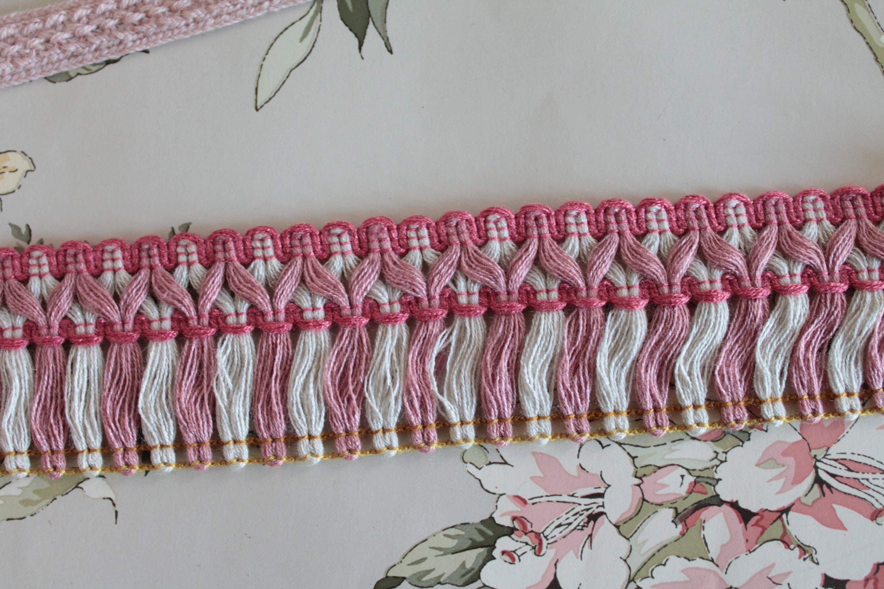 Vintage pink upholstery ribbon, pink braid, pink border, between two