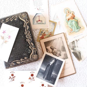 Roman parish missal + 8 old religious images + old pressed flowers