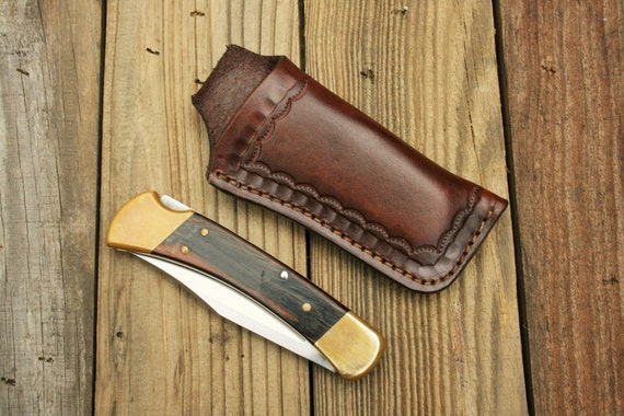 Buck Knives Buck 110 Folding Knife w/ CliP Style Leather Sheath