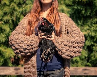 Raspberry sleeves oversize hand knitted cardigan