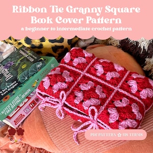 May include: A handmade crochet book cover in red and pink, featuring a granny square design and ribbon ties. The cover is displayed with books. The text "Ribbon Tie Granny Square Book Cover Pattern" is visible at the top.