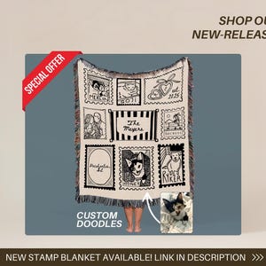 May include: A cream-colored woven blanket featuring custom doodle designs in a stamp-like format. The blanket includes various illustrations, text, and a photo of a cat. Text on the blanket includes "Merlin", "Goji", "The Meyers", "Pocahontas, IL", "Honey", "Ryker", and "est. 2025".