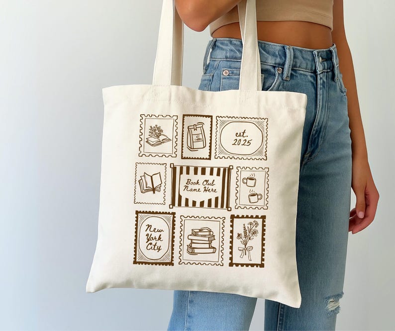 May include: Cream-colored tote bag featuring brown postage stamp designs. Stamps include images of books, coffee cups, and flowers. Text includes "Book Club Name Here", "New York City", and "est. 2025". The bag has long handles.