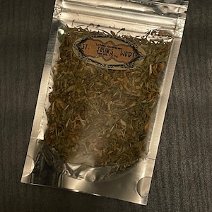 May include: A silver resealable pouch containing dried St John's Wort herb. The label reads "LeBeau Apothecary, St John's Wort, Net Wt. 1/2 oz."