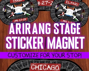 May include: Oval-shaped stickers or magnets featuring a black grid pattern with white text including city names like Paris, El Paso, and Chicago, along with song titles and dates. The design includes colorful graphic elements like fire and fireworks.