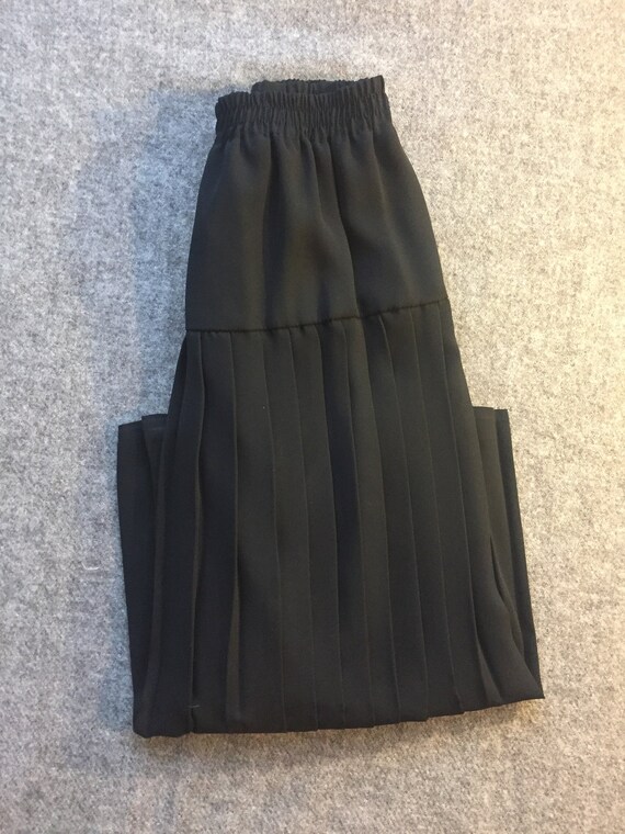 black pleated skirt
